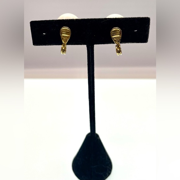 Vintage Signed Monet Gold Tone White
Lucite Ball Clip On Earrings - Picture 4 of 9